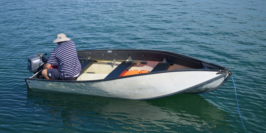 Mark checks out a dinghy that is available to trade